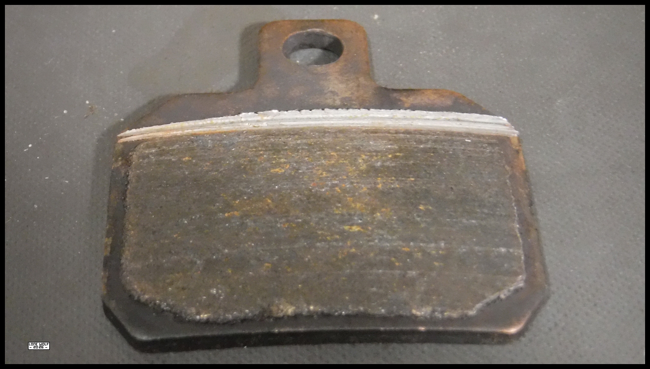 A very worn brake pad