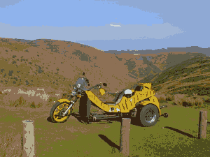 The Tiger-coloured Trike on top of the Long Myndd.
