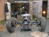 At last, it sits on its own three wheels.